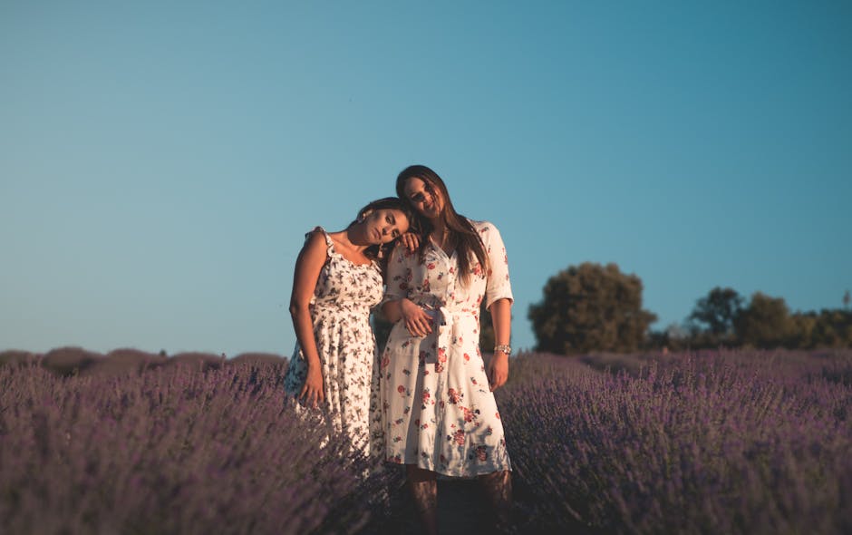 A serene lavender field with a person making a phone call, symbolizing the connection between lead qualification and a flourishing lavender business.