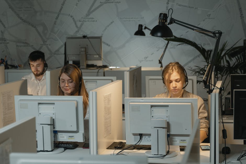 A visual representation of a call center with agents actively engaging with customers, showcasing the process of reviewing call recordings.