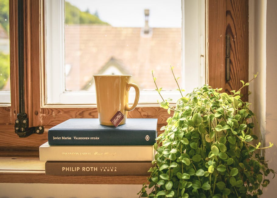 A cozy, inviting tea house interior, highlighting a variety of tea options and happy customers chatting over tea.
