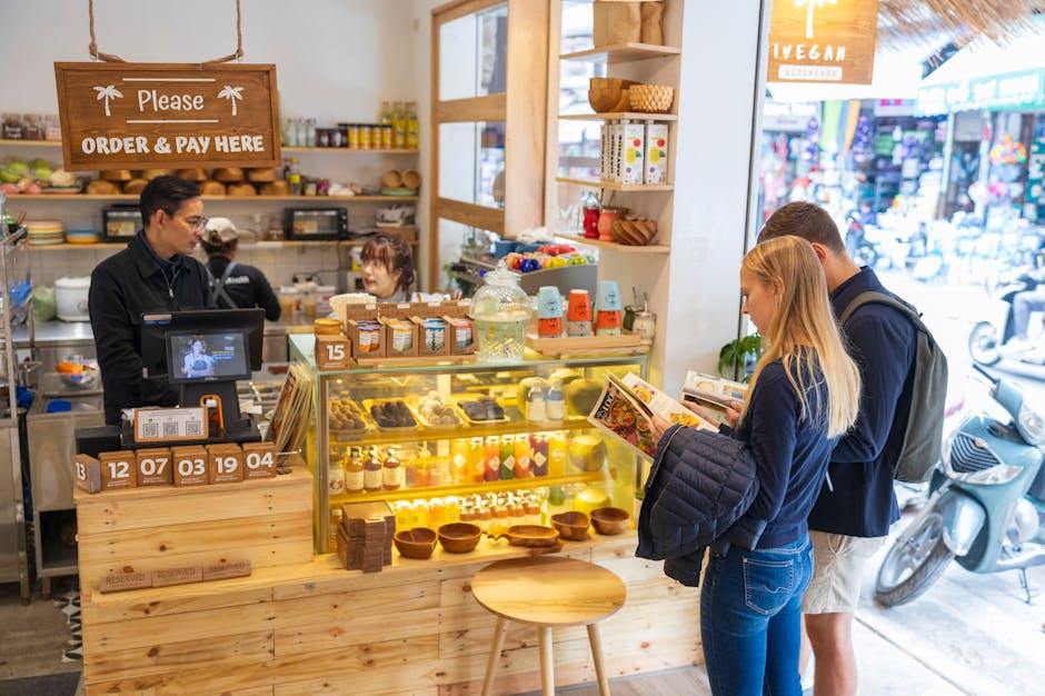 A vibrant image of a friendly vape shop agent engaged in a phone call with a customer, showcasing the inviting atmosphere of the shop.