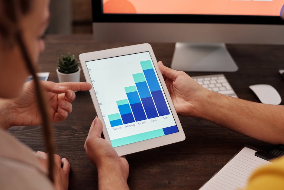 A vibrant workspace with team members collaborating on campaign strategies, featuring digital interfaces displaying live data analytics.