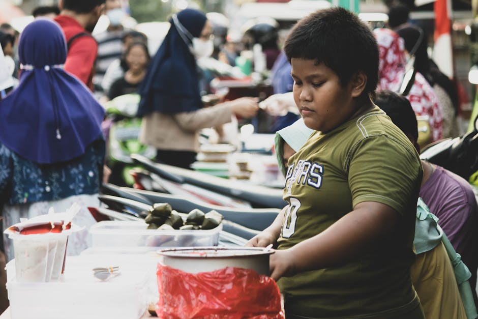 A vibrant community market setting with small business owners interacting with customers, showcasing innovative outreach strategies.