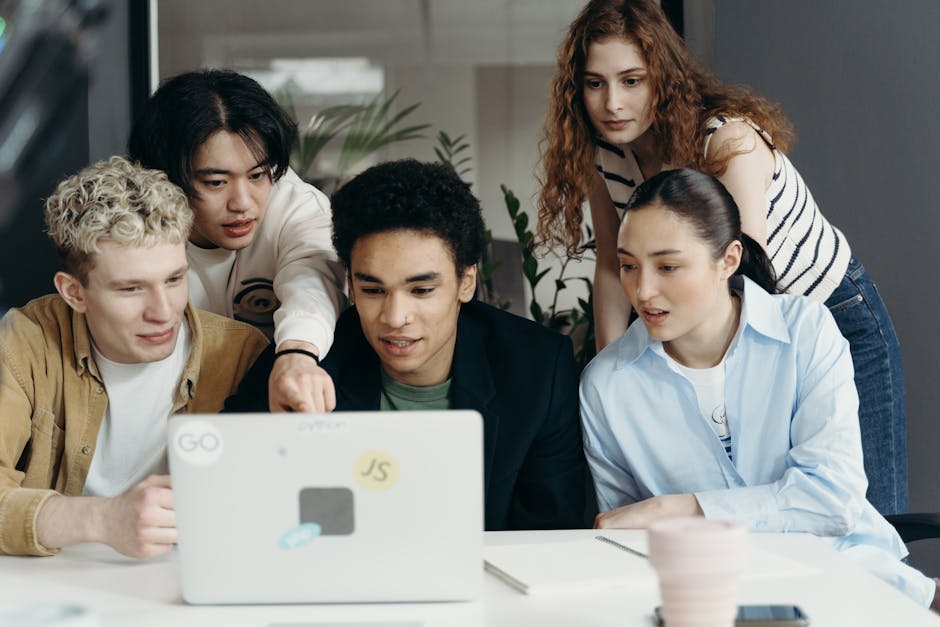A diverse group of professionals engaged in a productive phone call, surrounded by tools and technology, illustrating the essence of effective communication.