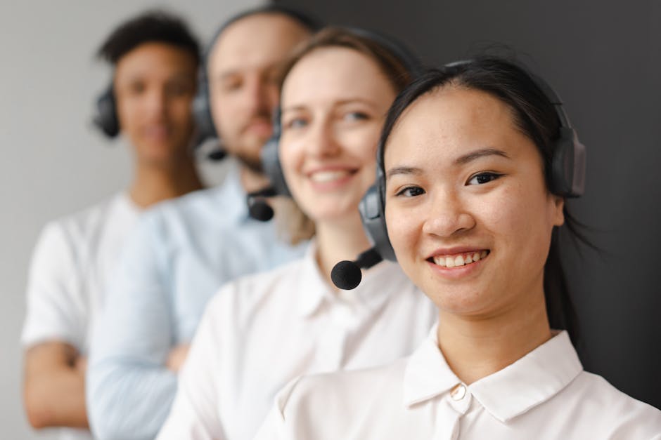 A group of diverse entrepreneurs engaged in a training session, focusing on utilizing AI technology for customer service solutions.