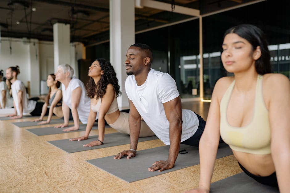 A vibrant yoga studio with diverse participants engaging in a specialty class, emphasizing community and inclusion.