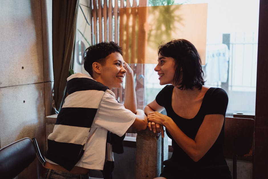 A cozy coffee shop scene showing happy customers enjoying coffee, highlighting personal connections.