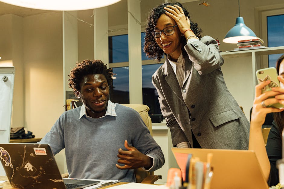 A vibrant image showing a diverse group of entrepreneurs engaged in a dynamic brainstorming session, surrounded by digital screens displaying AI technology.