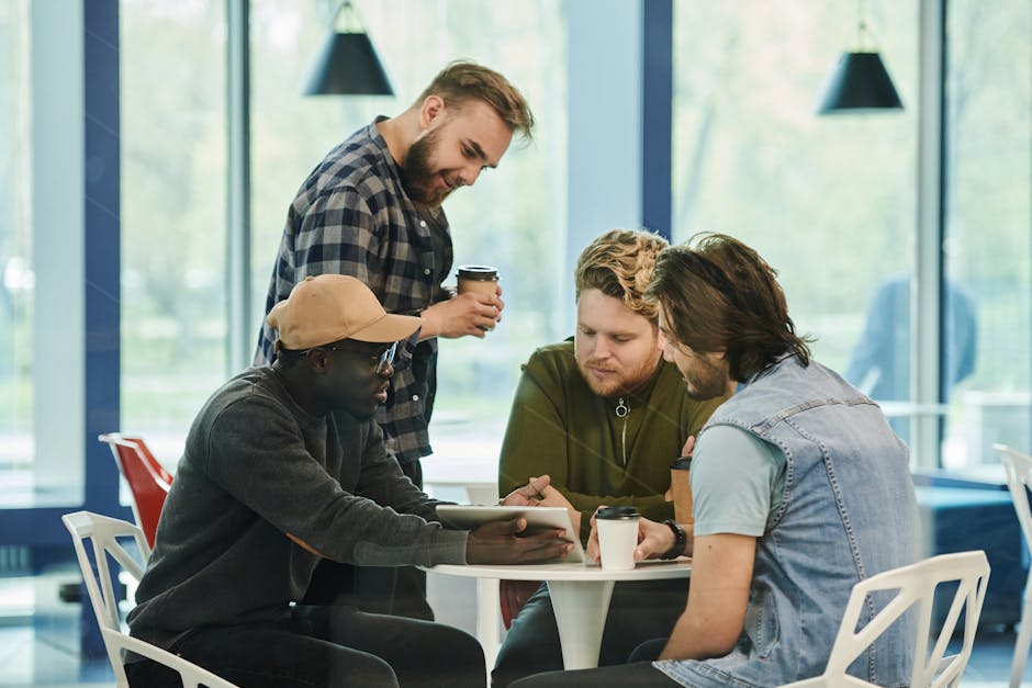 A vibrant office scene showing business professionals collaborating and using apps on their devices, highlighting customer engagement.