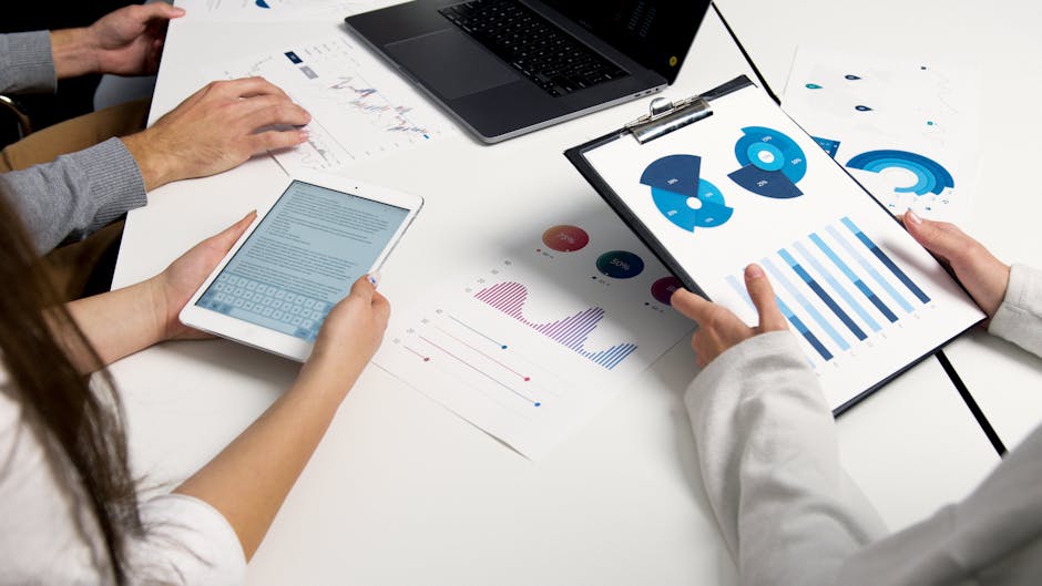 An engaging image depicting a businessperson attentively listening to voicemails on a digital device, surrounded by data graphics symbolizing customer engagement.