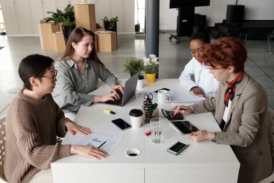 A vibrant illustration showing a diverse team collaborating with digital tools, emphasizing connectivity and productivity.