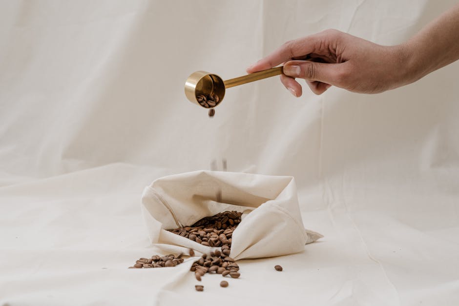 A bustling specialty coffee shop with baristas expertly brewing coffee, surrounded by bags of sustainably sourced beans.