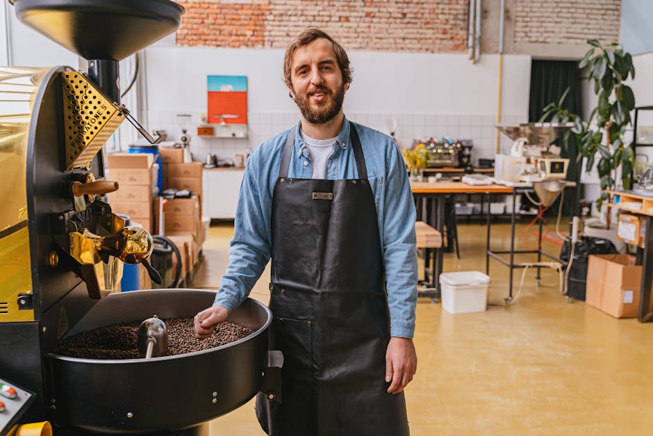A modern coffee roastery with equipment like roasting machines and grinders, showcasing the art of roasting specialty coffee.