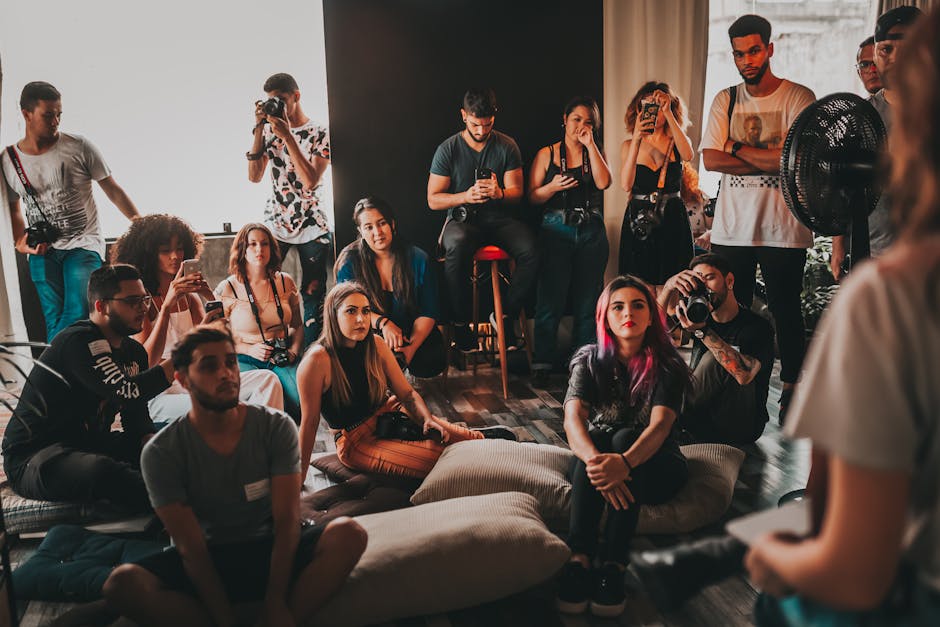 A vibrant yoga studio with diverse attendees practicing in a sunlit room, showcasing community and engagement.